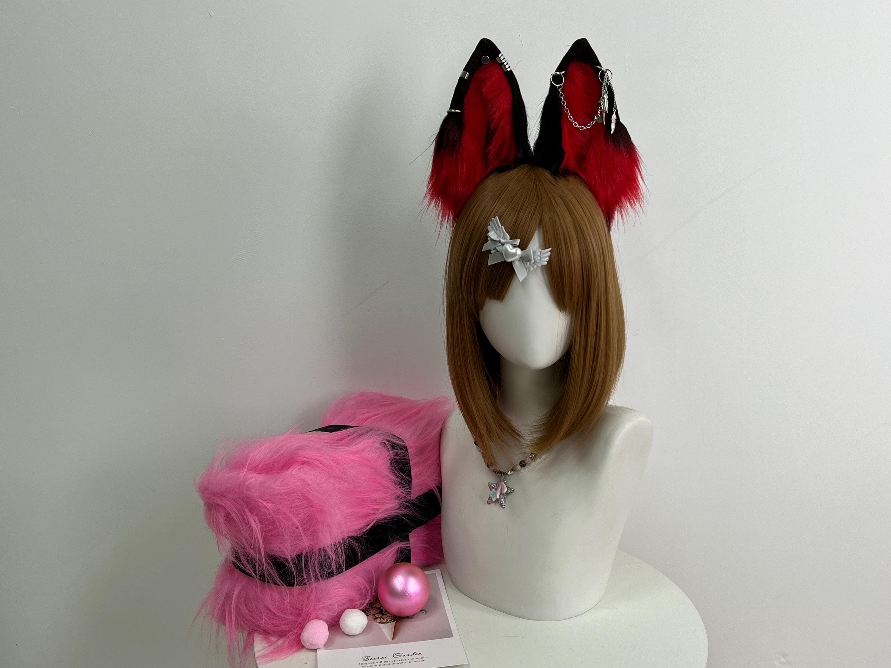 Black and crimson red faux fur wolf ears headband front view with handmade scarlet red inner fur under jet black outer panels. Silver stud rivets bar cuffs chain hoops and small dangle charm piercings accent both ears for edgy witchy vibe. Pointed tall wolf ear silhouette handcrafted for therian gear fursona wear dark cosplay convention looks vampire goth outfits Halloween parties fantasy LARP events Ren Faire fantasy roleplay and dramatic animal ear costume statement pieces for alt fashion.