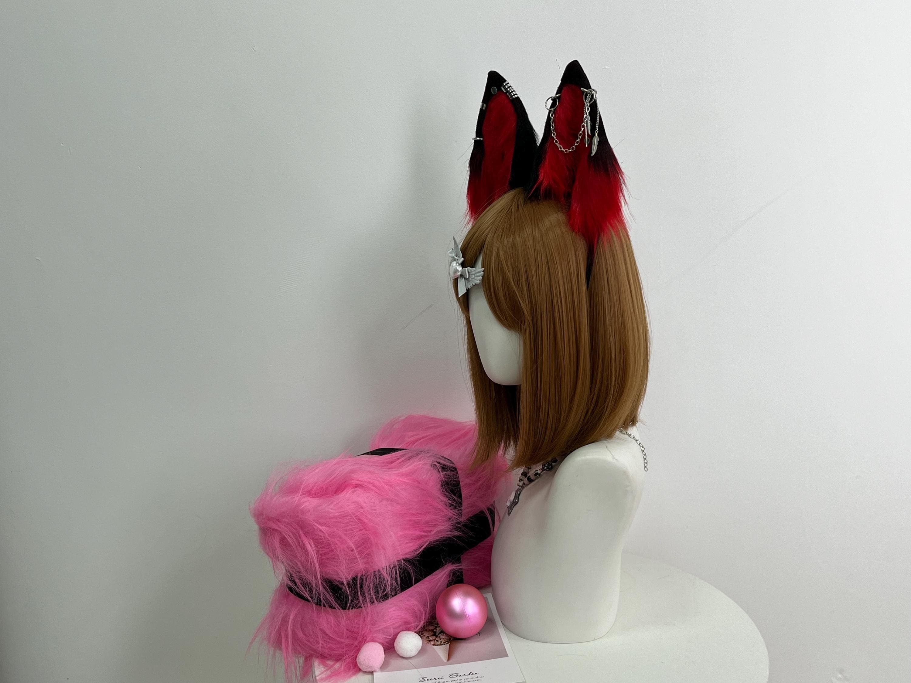 Side angle view black crimson red wolf ears headband showing deep warrior red inner fur catching light from a dramatic profile vantage. Tall upright pointed feline wolf ear shape stands proud with silver industrial hardware visible in dimensional detail. Pick for witchy gothic vampire aesthetic looks alt dark academia dungeon synth metalhead punk alternative lolita emo scene kid pastel goth or dark cottagecore outfits that need a wild realistic blood red animal ear accent piece.