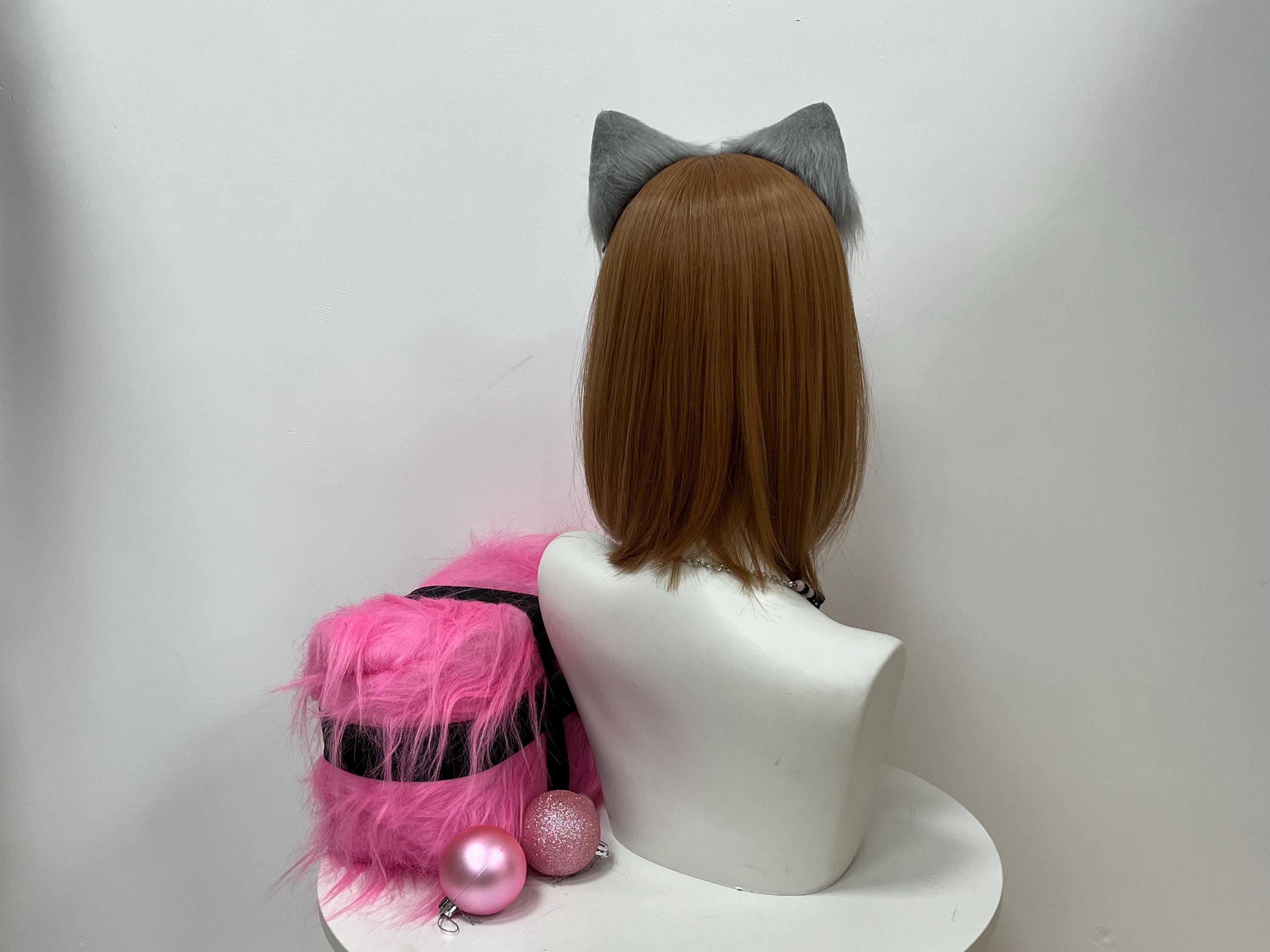 Rear profile of the handcrafted cat ears headband displaying solid pearl-grey outer fur across both curved shells and the smooth tight arc of the flexible band bridging neatly over the mannequin scalp. The angle highlights tidy stitching, even symmetry across both sides, and a plush brushed backing which wraps the head comfortably for all-day wear during furry meetups, anime con marathons, or Halloween street photoshoots without once slipping loose.