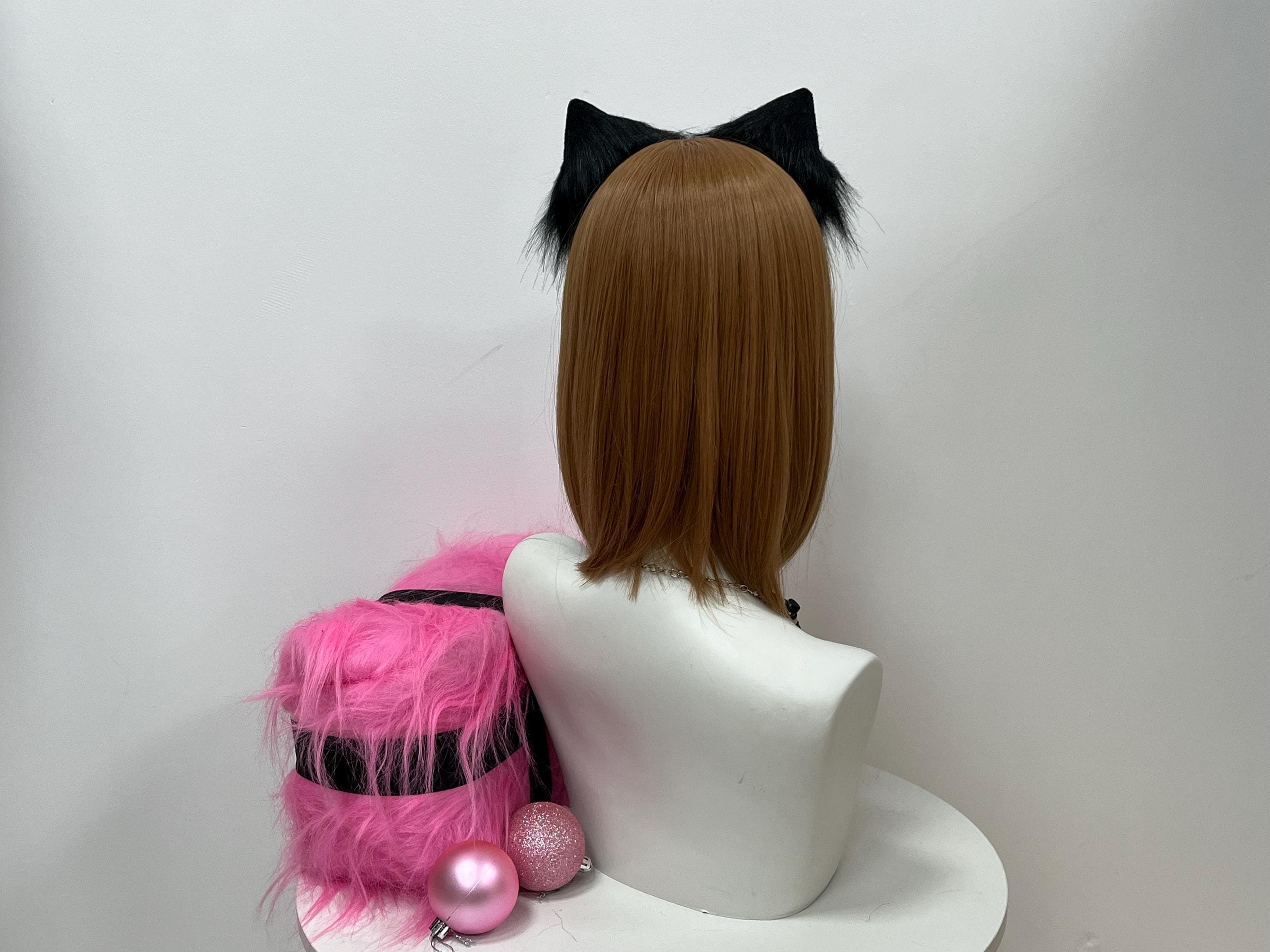Rear view showcasing the deep charcoal back of each wolf ear, where dense black faux fur meets the hidden headband arch for a clean finish on both sides. No awkward seams or plastic glare showing, just handcrafted density mimicking a real lupine pelt hugging the scalp. Great for convention photographers shooting your therian look from every angle, or for streamers framing rotating setups where the back of the head looks just as polished as the front.