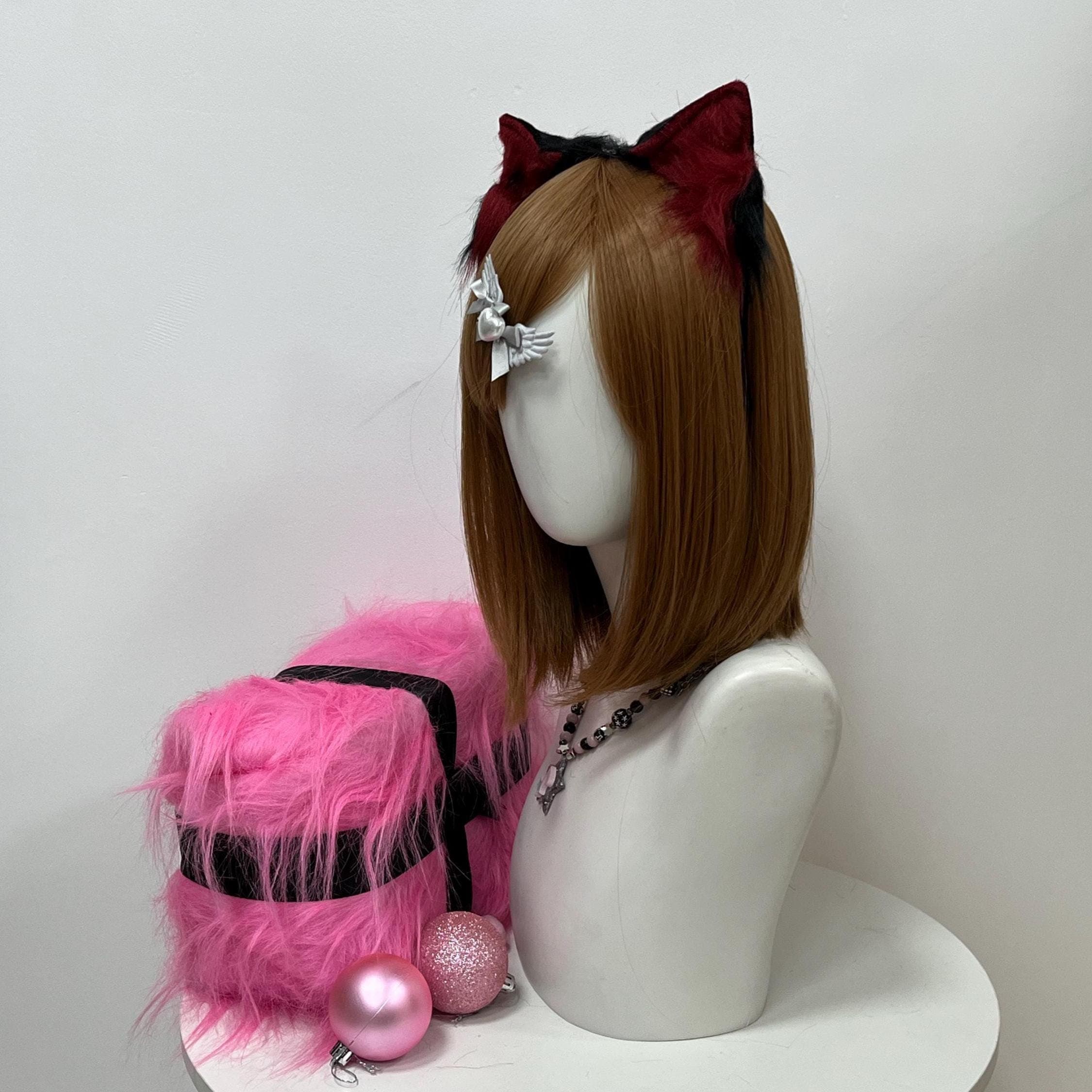 Side profile of the maroon and black wolf ears showing the natural forward tilt, crimson front fur, and blackened outer edges. Handmade shape holds its curve through full convention days without drooping or flopping over. Stacks beautifully with bard rogue armor sets, kemonomimi lolita drops, therian photoshoots, or fursuit head swaps. Slide them over any hairstyle for an instant dark wolf aesthetic turning cosplay fits into feature-ready character builds.