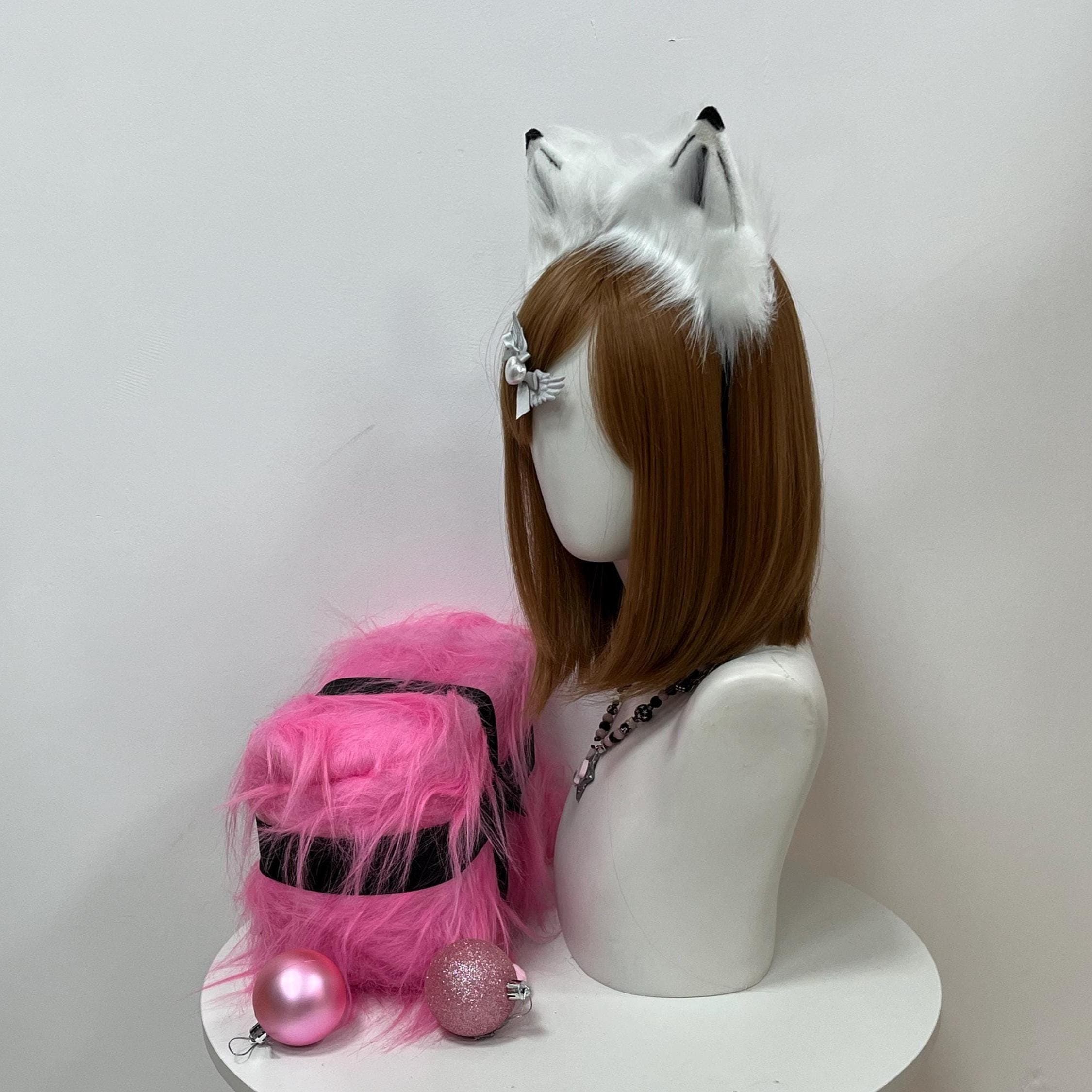 Side profile of the realistic wolf ears highlights the natural pricked ear curve and hand-trimmed black tip detailing along the outer edges. White faux fur layers in soft tufts around the base, mimicking the dense winter coat of a wild timberwolf. Perfect side angle for cosplayers planning anime con appearances, fursona reveals, or coastal wolf character builds. The wolfear headband stays anchored through head turns, energetic leaps, and dramatic poses.