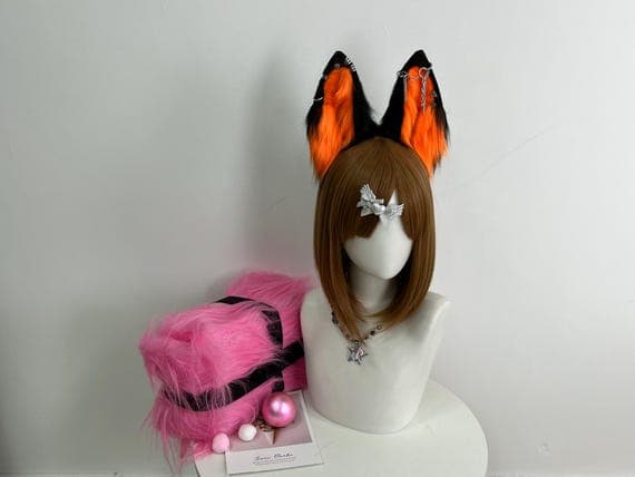 Realistic faux fur wolf ears in orange and black, attached to a comfortable handmade headband for cosplay costumes and Halloween events. These custom wolf ears are perfect for furry community members, therian cosplay, and animal-themed parties. Featuring soft faux fur, these orange black wolf ears are lightweight, durable, and designed for long wear. A unique accessory for cosplay lovers and handmade costume enthusiasts.