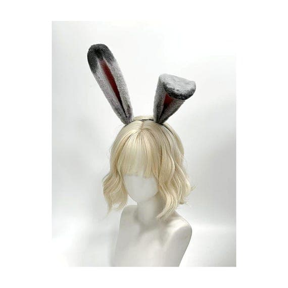 Three quarter angle grey and deep rose bunny ears headband displaying how poseable wire frame ears sit naturally on head for realistic rabbit costume cosplay. Soft plush grey faux fur with dusty pink rose inner ears creates dimensional look in photos perfect for Easter bunny Halloween costume anime convention rave festival outfit. Long upright rabbit ears bend to desired position stay in place all day comfortable lightweight design ideal for cosplay photoshoots streaming content creation gift fo