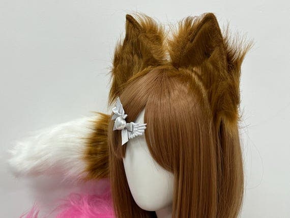 Lifelike fox ears, paws, and tail set made from soft faux fur for cosplay and costume enthusiasts. Features adjustable headband for comfort and bendable tail for a realistic look. Ideal for Halloween, roleplay, and anime-inspired outfits. Available in colors like brown, gray, and black. Perfect for furry fandom events, petplay, and cosplay conventions. Customizable to suit different animal and fox-themed costumes.