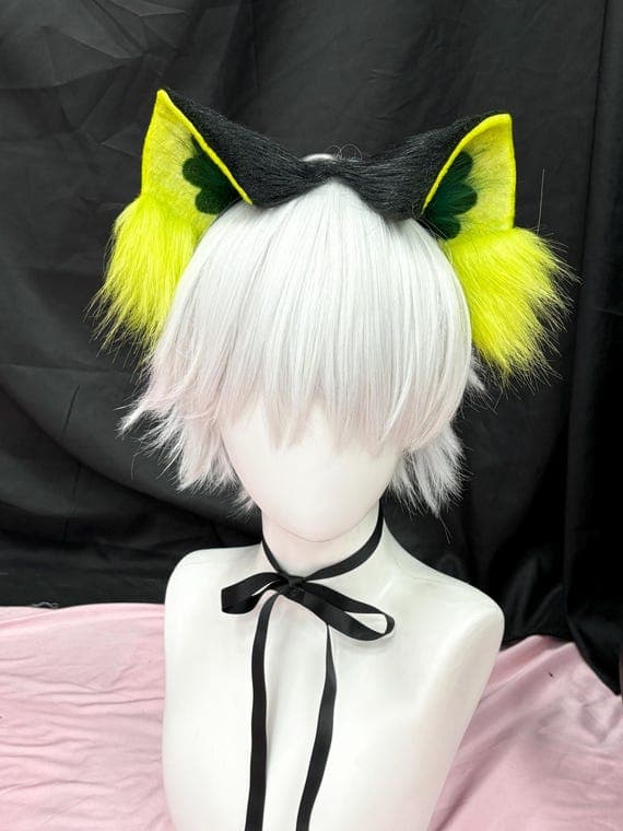 Neon yellow-green fluorescent cat ears headband photographed against dark black background highlighting vibrant lime yellow electric color perfect for rave costumes night events. Bright neon yellow faux fur with dark green accents creates stunning contrast, eye-catching from across room at anime conventions EDM festivals. Fluffy realistic cat ear design with yellow tufts at base, mounted on comfortable slim headband for catgirl neko kemonomimi therian Halloween cosplay streaming props furry meet