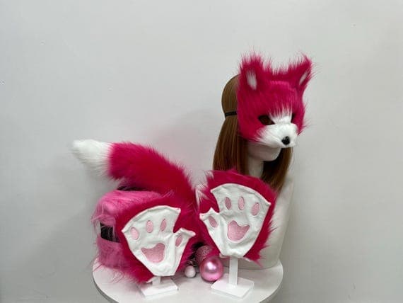 Soft fox ears, paws, and tail set made from premium faux fur, designed for cosplay and costume events. The fluffy fox ears provide a cute, realistic look, while the paws are designed with intricate details to enhance your animal-inspired outfit. The plush tail attaches securely with a clip, adding the final touch to your fox cosplay. Perfect for furry enthusiasts, Halloween costumes, themed parties, and animal roleplay events